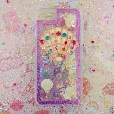 キラキラ流れるラメにシェルPhoneケース